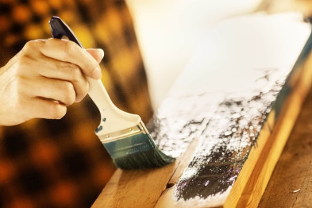 Oil-Based Paints Provide a Hard Protective Cover on the Wood