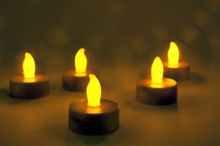 Use Flameless Tea Lights or Votives to Create Subtle Warmth That Lasts