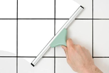 The Squeegee Handle Can be Long or Short but Should Always be Non-Slip